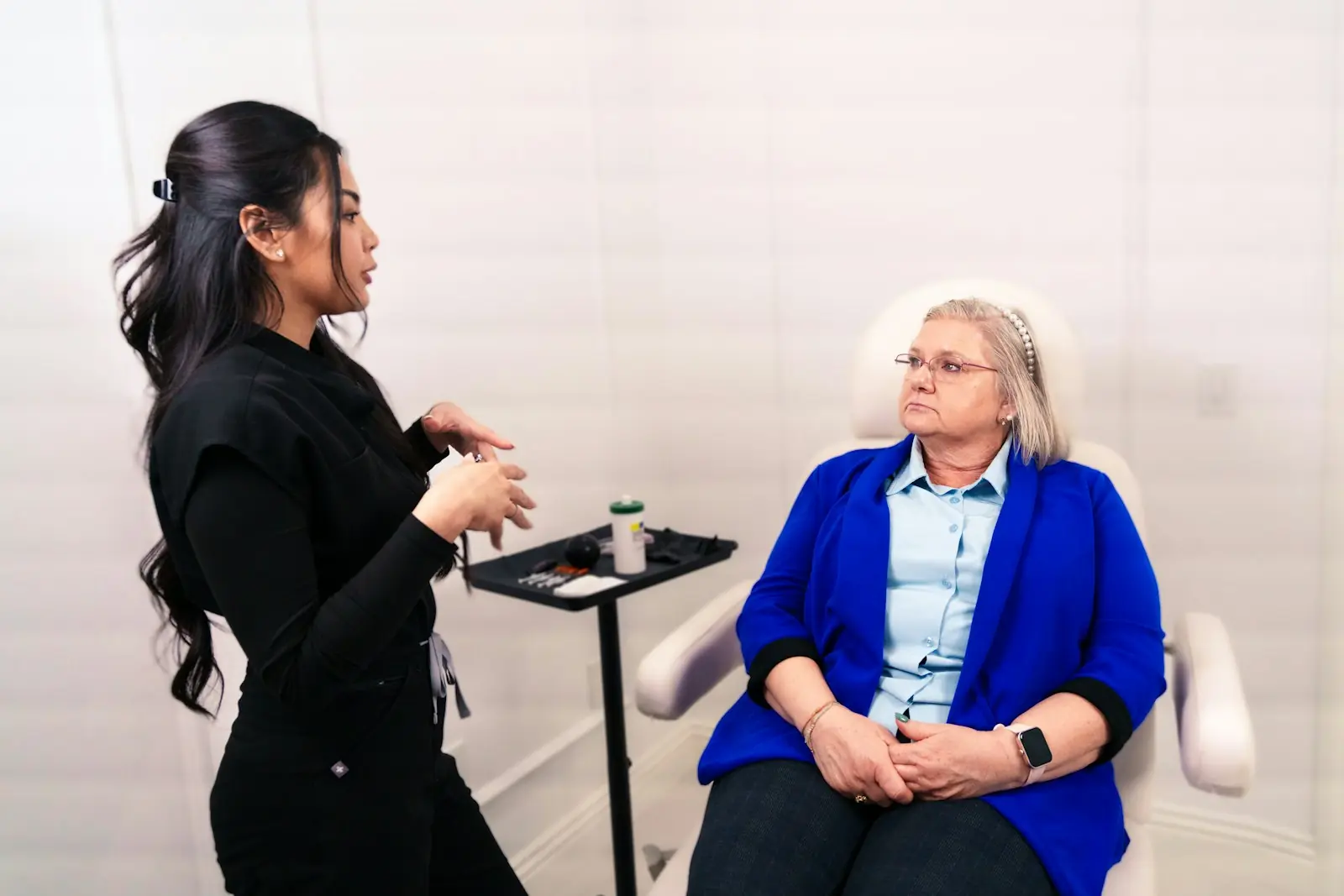 A med spa provider consulting with a client